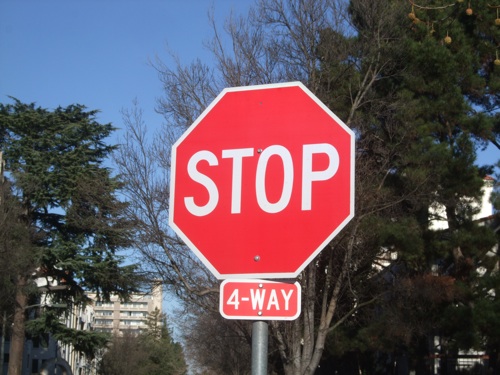 red stop sign, white letters